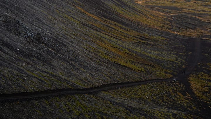 a long gravel road in an isolated region of Iceland